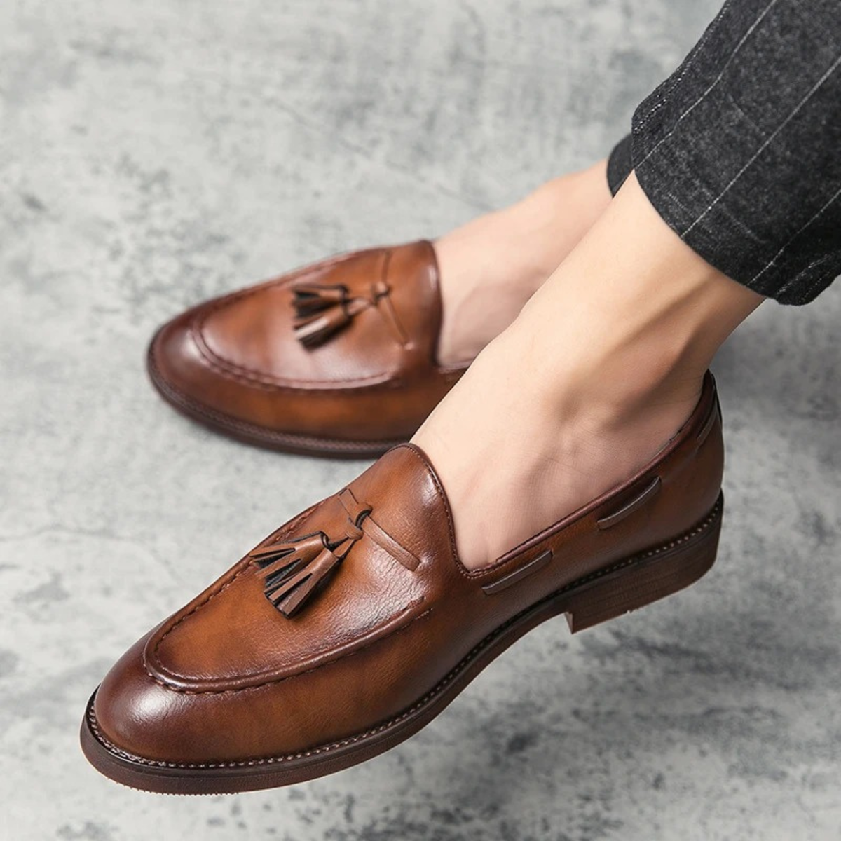 The Hawthorne Park Men’s Pointed Toe Tassel Faux Leather Slip On Loafers